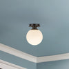 Otis 8-in Matte Black/Glossy Opal Glass Socket Semi-Flush Mount